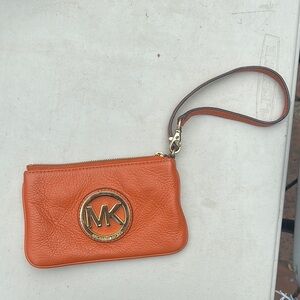 Michael Kors Tangerine Wristlet with Gold Logo